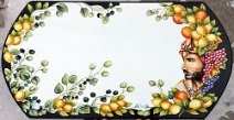 art: TROFF-110 Tavolo in pietra lavica oblungo con decoro limoni, capperi e bordo intagliato a rilievo