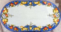 art: TROFF-262018 Tavolo in pietra lavica ovale con frutta e fiori